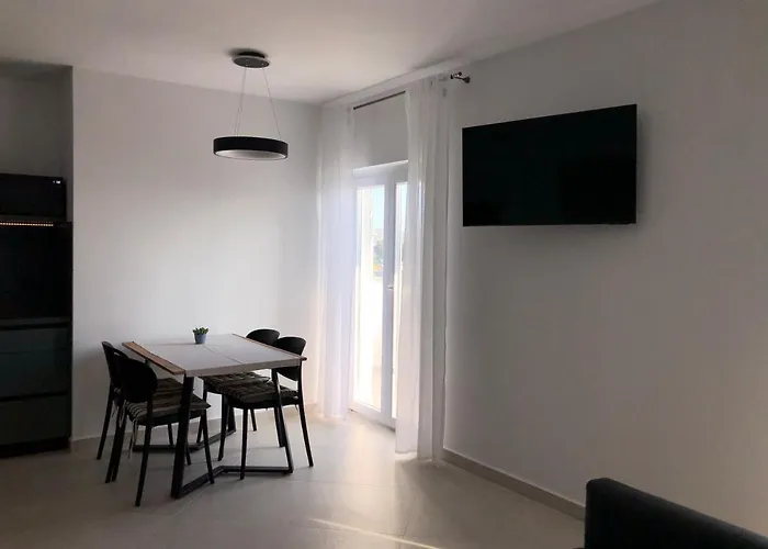 Aco Couette-café Barbat na Rabu